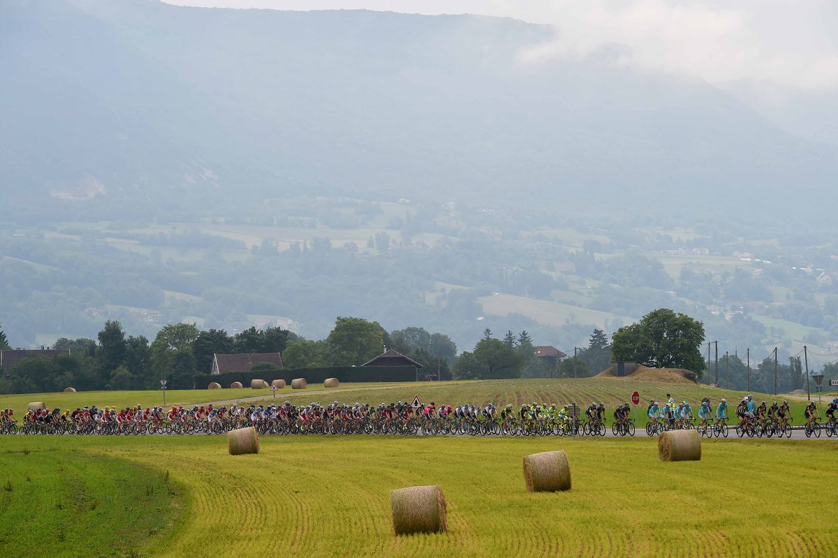 The teams ride in formation