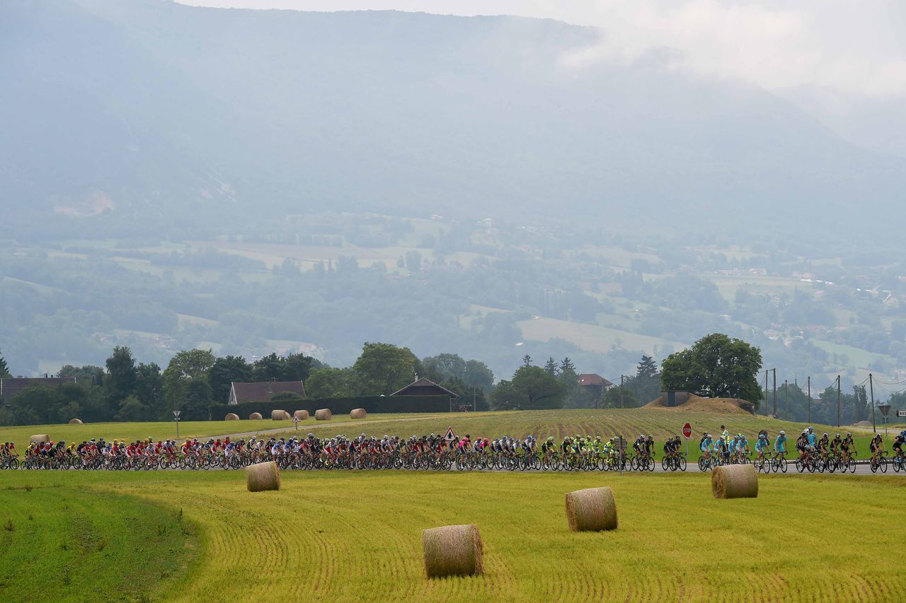 The teams ride in formation