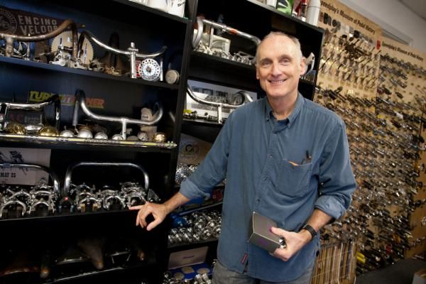 Speedplay pedal's inventor and president Richard Byrne in his office, surrounded by historic and rare cycling parts, including nearly every significant pedal in the history of the bicycle.