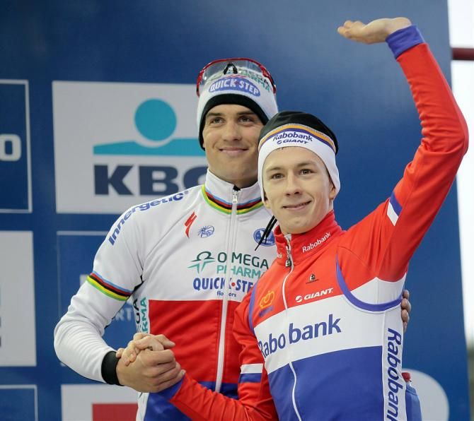 Czech champion Zdenek Stybar congratulates Heusden-Zolder World Cup winner Lars van der Haar as the Dutchman steps onto the podium