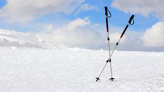 Ski poles in the snow
