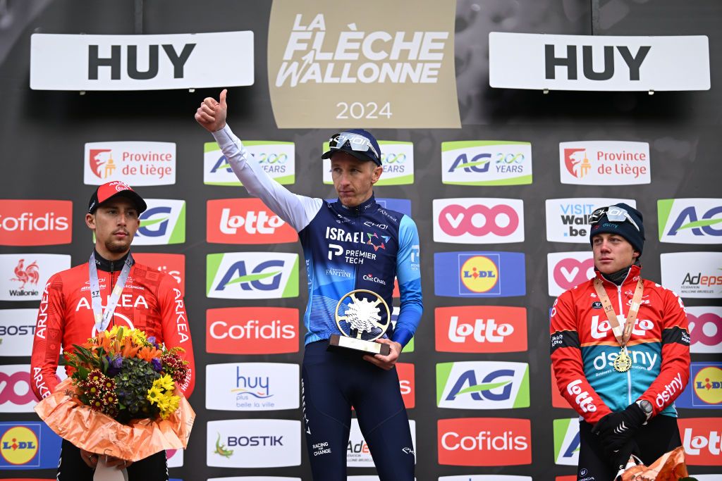 HUY BELGIUM APRIL 17 LR Kevin Vauquelin of France and Team Arkea BB Hotels on second place race winner Stephen Williams of The United Kingdom and Team Israel Premier Tech and Maxim Van Gils of Belgium and Team Lotto Dstny on third place pose on the podium ceremony after the 88th La Fleche Wallonne 2024 Mens Elite a 1986km one day race from Charleroi to Huy UCIWT on April 17 2024 in Huy Belgium Photo by Dario BelingheriGetty Images
