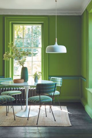 A bright green dining room