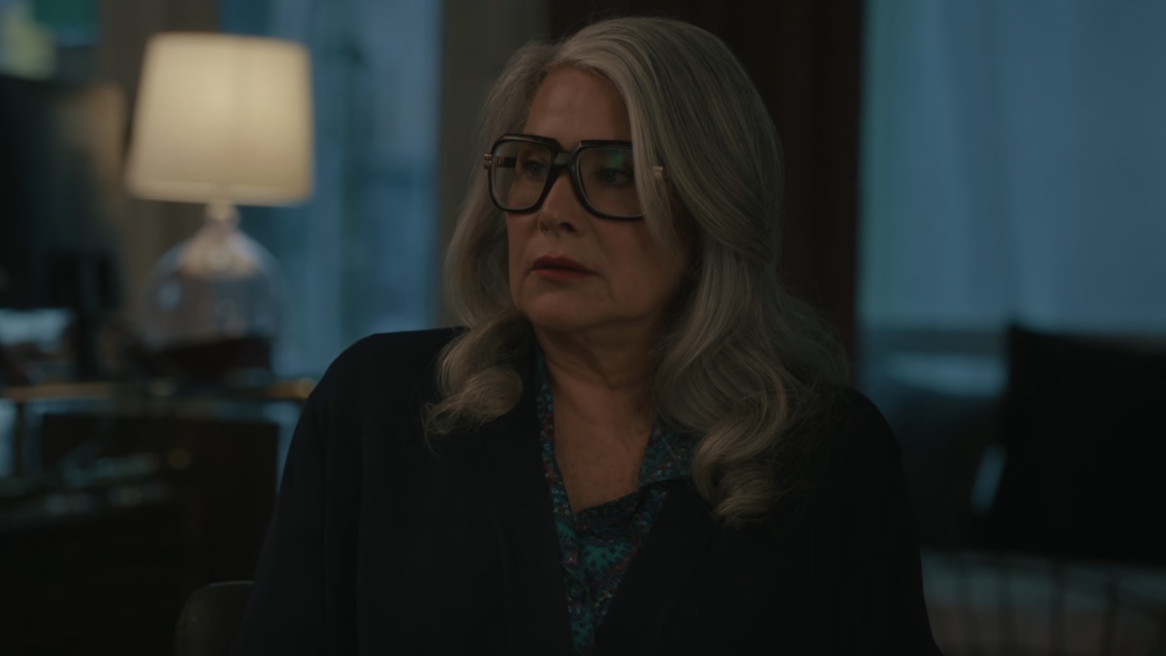 Lorainne Bracco talking to the other women in Nonnas after getting her hair and makeup done.