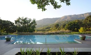 Hilton Shillim Estate Retreat & Spa, Pune, India - Pool overlooking the mountains