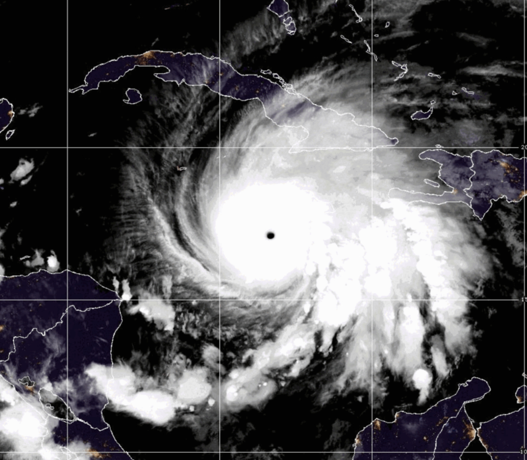 An image of a time lapse showing the progress of Hurricane Melissa, as this white hurricane crosses the dark blue ocean.