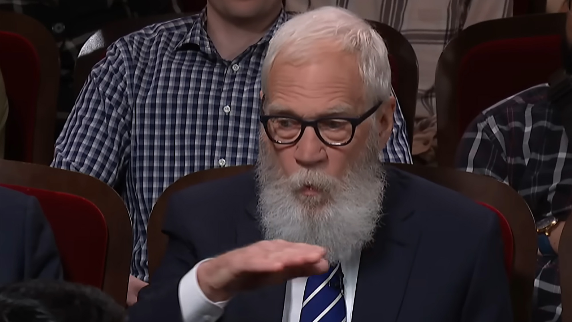David Letterman sitting in an audience chair during his final Late Show appearance in 2026. 