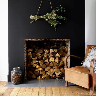 black painted fireplace wall by dulux