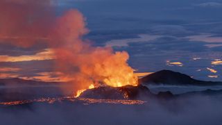 Fagradalsfjall volcano in Iceland erupting at dusk 