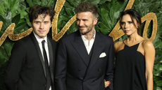 David, Victoria and Brooklyn Beckham.