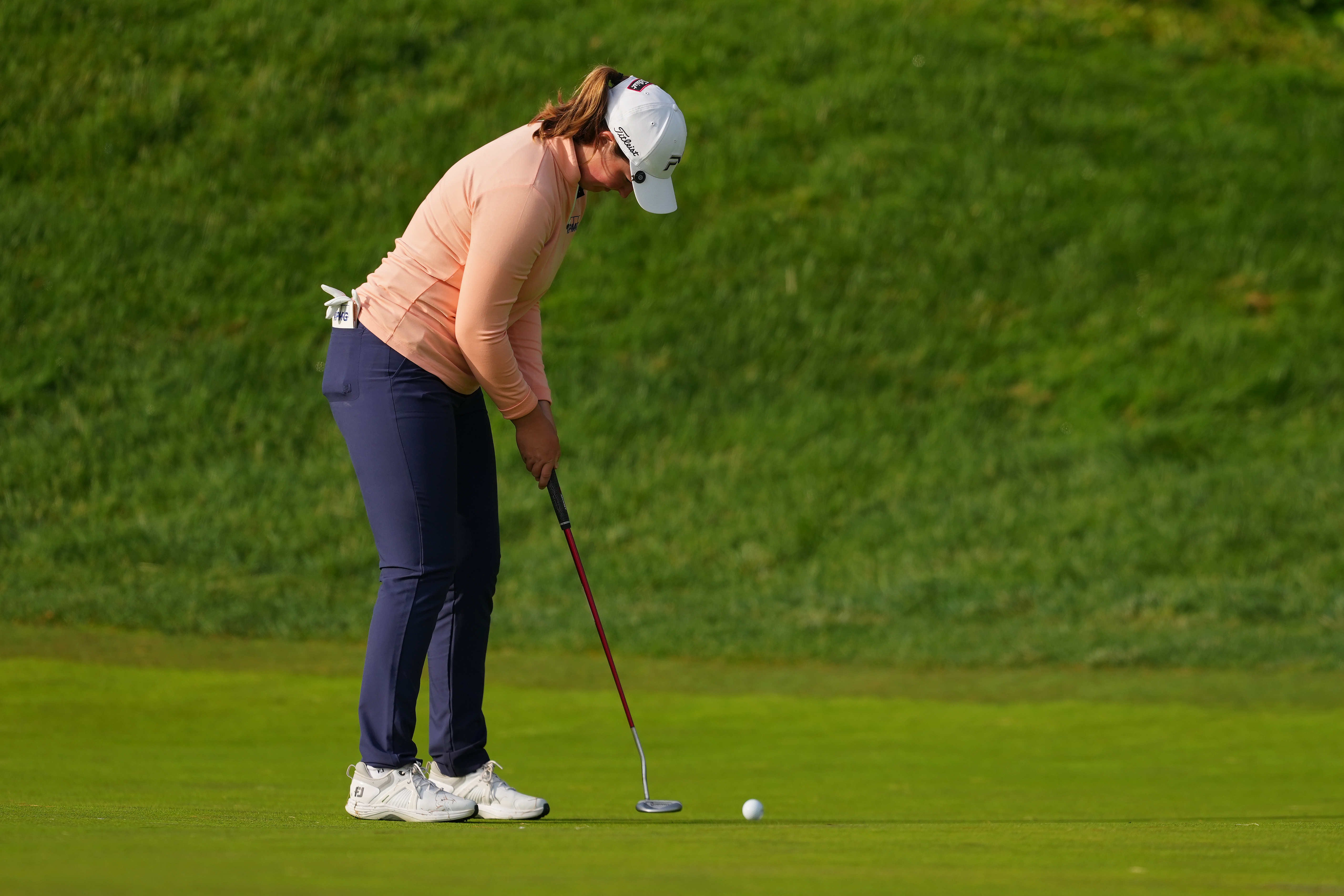Lottie Woad of England putts on the 11th green during the second round of the Kroger Queen City Championship