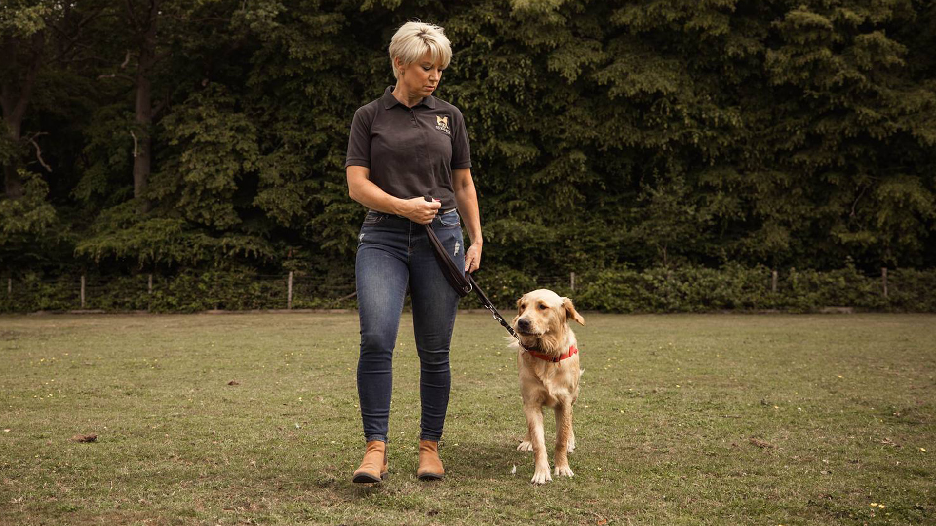 Helen walking dog on leash