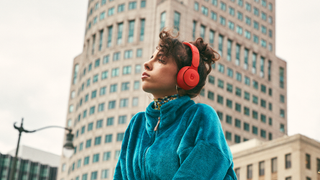 Beats Solo Pro worn by woman in city