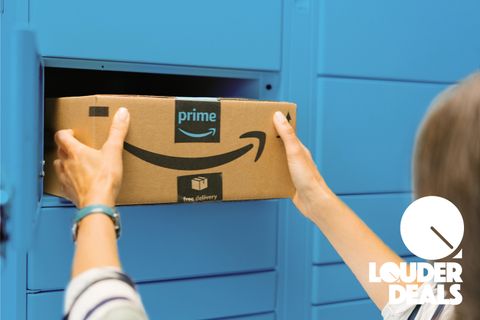 Women removes an Amazon parcel from a blue collection point