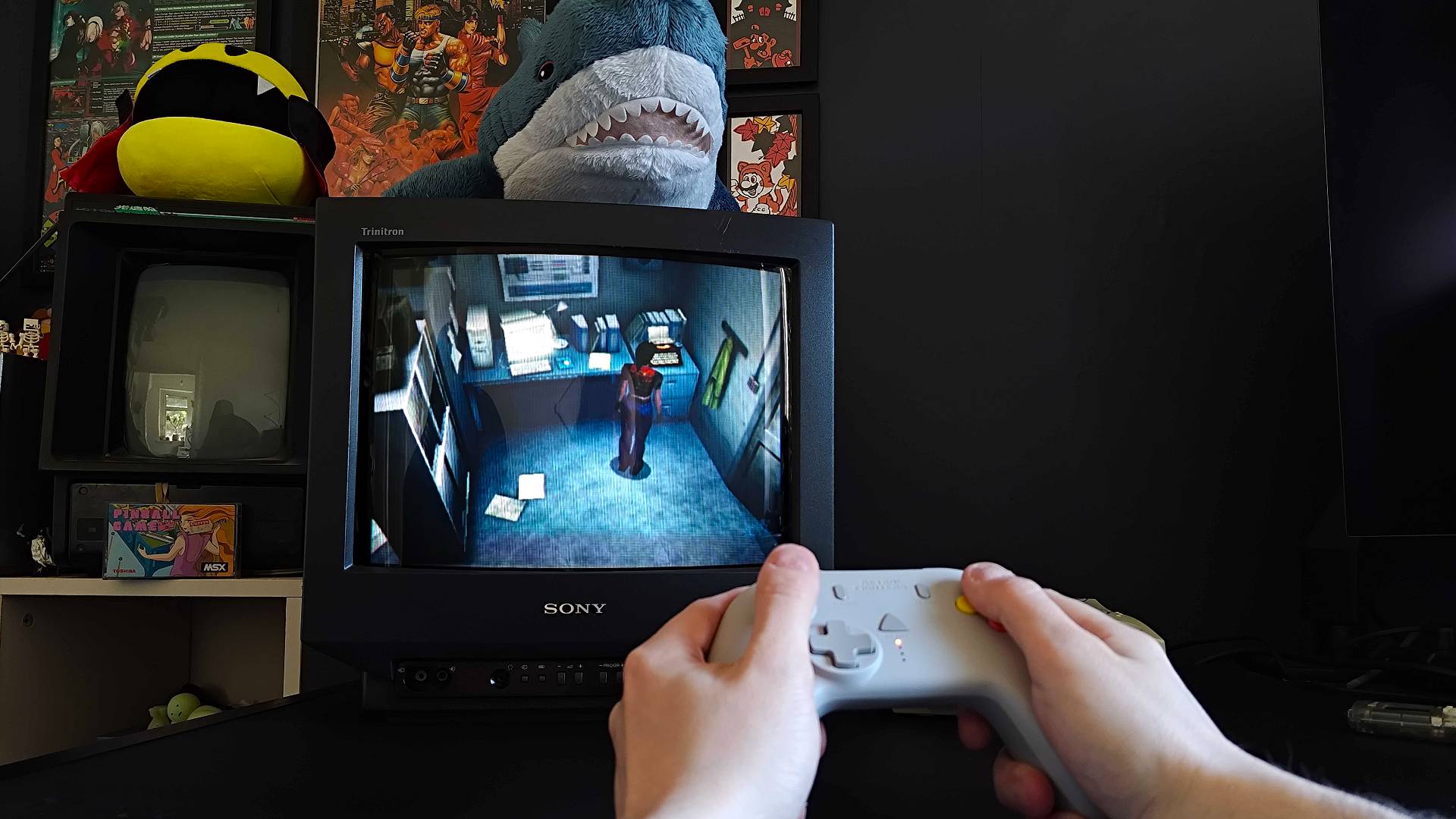 Phil Hayton using Retro Fighters StrikerDC to play Resident Evil - Code: Veronica for Sega Dreamcast on Sony Trinitron CRT TV.