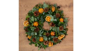 Berried clementine wreath with pinecones