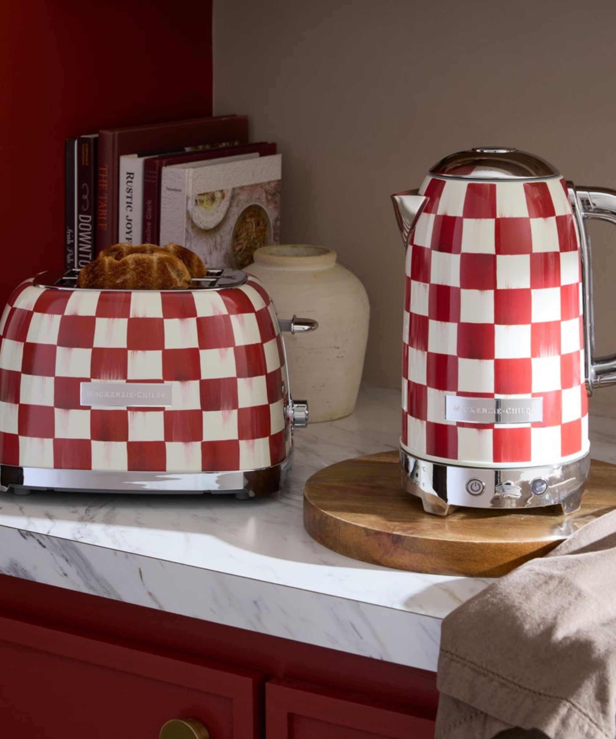 Red and white check print toaster and electric kettle