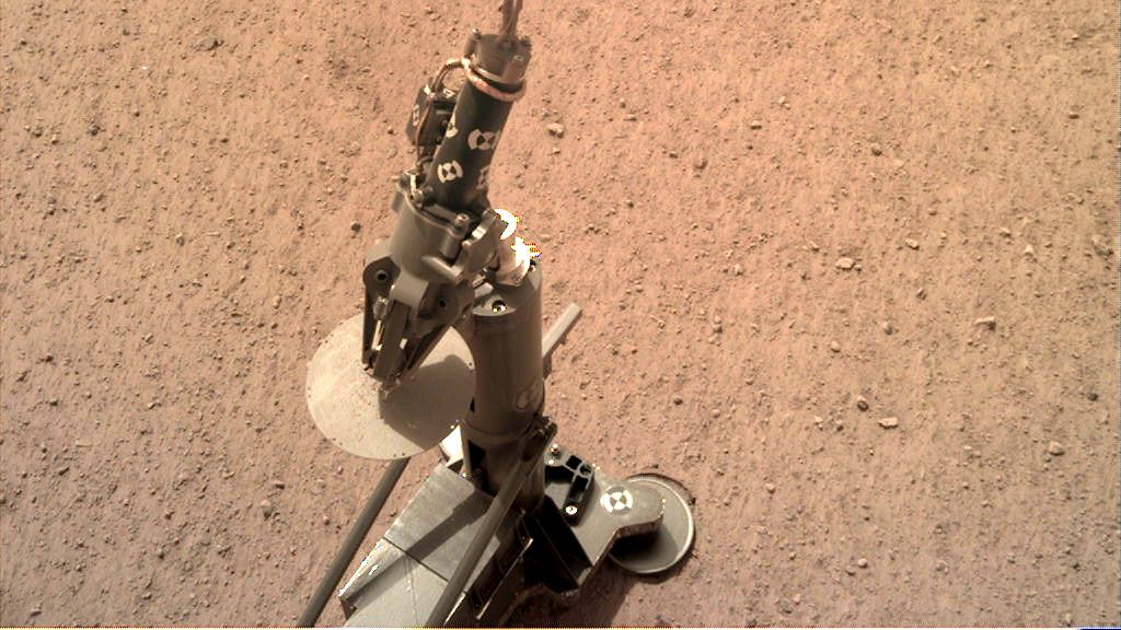 The InSight lander&#039;s heat probe, as deployed on the surface of Mars and photographed on Feb. 12, 2019.