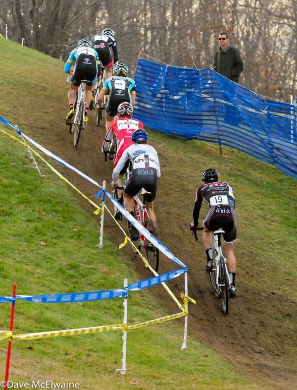The six leaders head up a climb on lap two