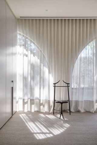 Linen curtains with chair