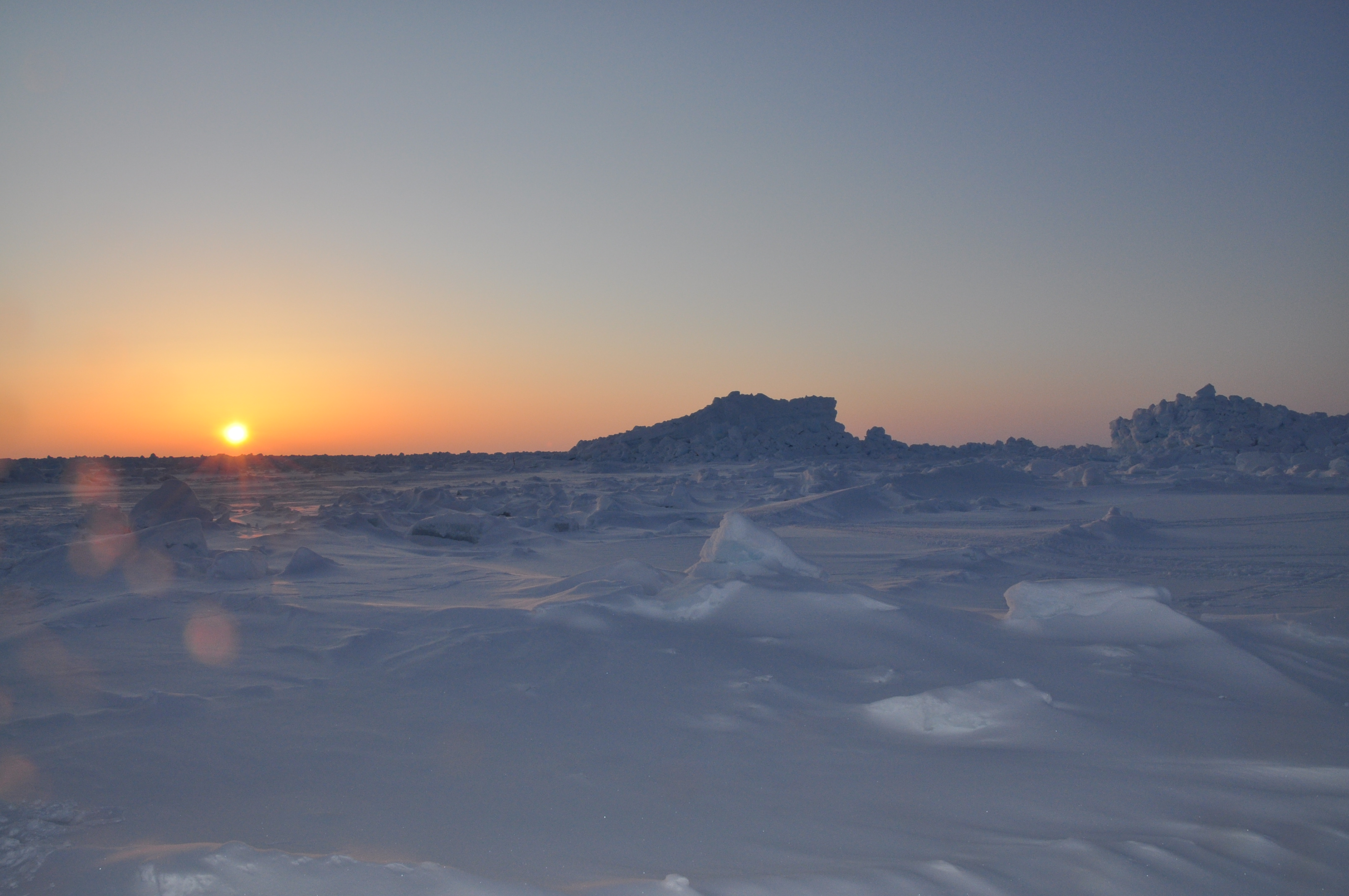 Sunset over the frozen Arctic Ocean near Barrow, Alaska.