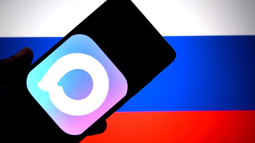 In this photo illustration, a MAX messenger app logo is seen displayed on a smartphone with a flag of Russia in the background.