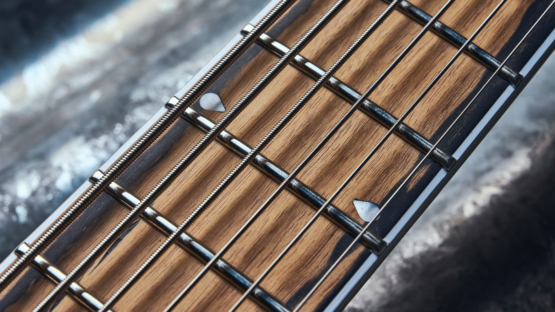 Close up of the Pale Moon ebony fretboard on the Jackson Signature Sleep Token IV Monarkh