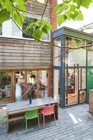 Hilary Satchwell and Richard Robinson used an awkward side return to create a bright, multifunctional kitchen-diner in their 1960s end of terrace in Forest Hill, London