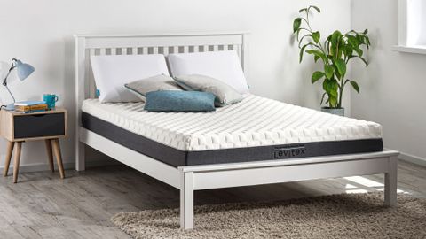 Levitex Gravity Defying Mattress review image shows the Levitex mattress on a white wooden bed frame