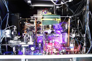 JILA's experimental atomic clock is based on strontium atoms held in a lattice of laser light.