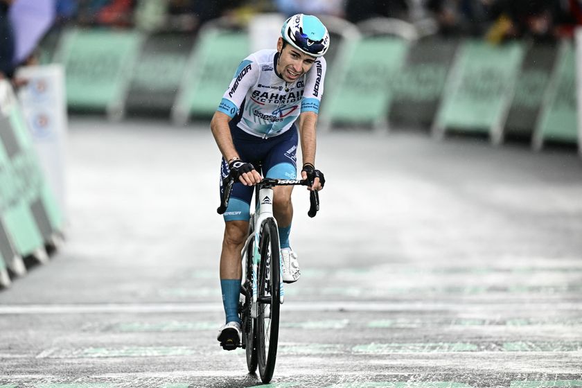 Bahrain - Victorious team&#039;s French rider Lenny Martinez cycles to the finish line of the 19th stage of the 112th edition of the Tour de France cycling race, 93.1 km between Albertville and La Plagne, in the French Alps, on July 25, 2025. The 19th stage of the Tour de France was shorted from its initial 129.9 km route, bypassing the Col des Saisies where an outbreak of nodular dermatitis in a herd of cattle was discovered, prompting organizers to modify the race route. (Photo by Loic VENANCE / AFP) (Photo by LOIC VENANCE/AFP via Getty Images)