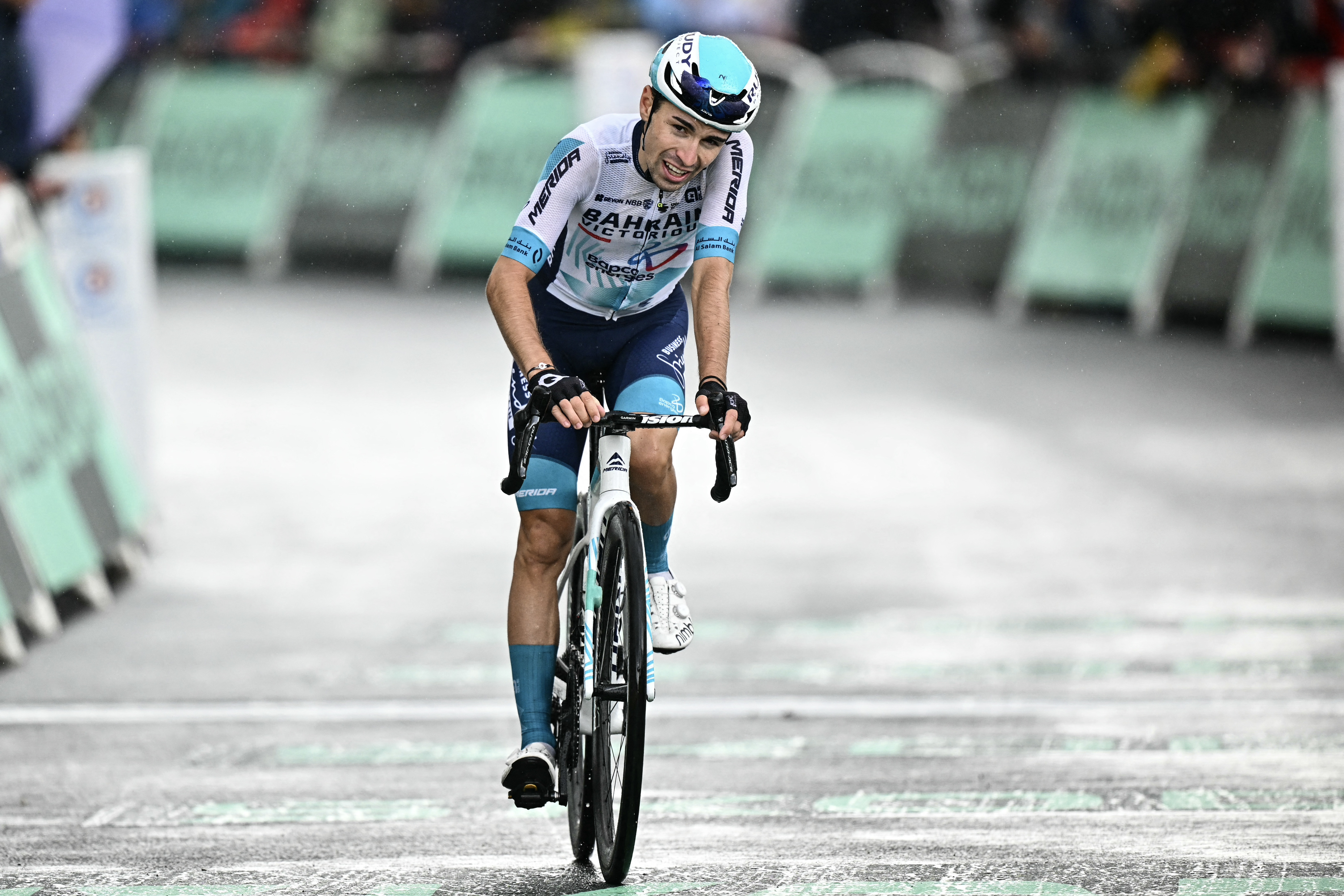 Bahrain - Victorious team&#039;s French rider Lenny Martinez cycles to the finish line of the 19th stage of the 112th edition of the Tour de France cycling race, 93.1 km between Albertville and La Plagne, in the French Alps, on July 25, 2025. The 19th stage of the Tour de France was shorted from its initial 129.9 km route, bypassing the Col des Saisies where an outbreak of nodular dermatitis in a herd of cattle was discovered, prompting organizers to modify the race route. (Photo by Loic VENANCE / AFP) (Photo by LOIC VENANCE/AFP via Getty Images)