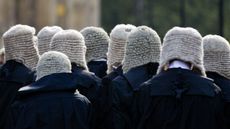 A group of judges in wigs