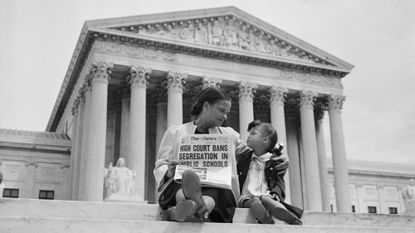 A woman explains desegregation to her daughter in 1954
