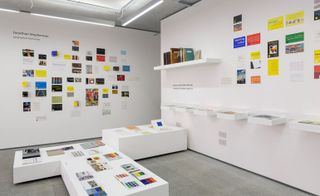 room with different coloured cards and materials on the walls