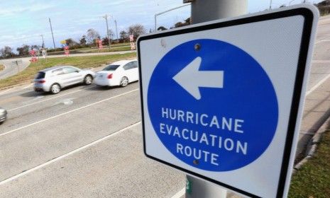 Motorists head north on the Loop Parkway in Lido Beach, N.Y., as Hurricane Sandy approaches on Oct. 27.