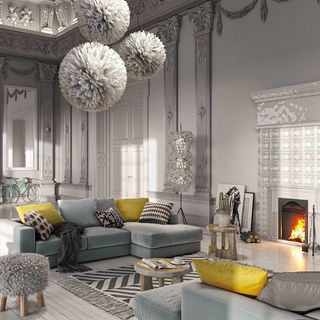 living room with grey fireplace and white wooden flooring