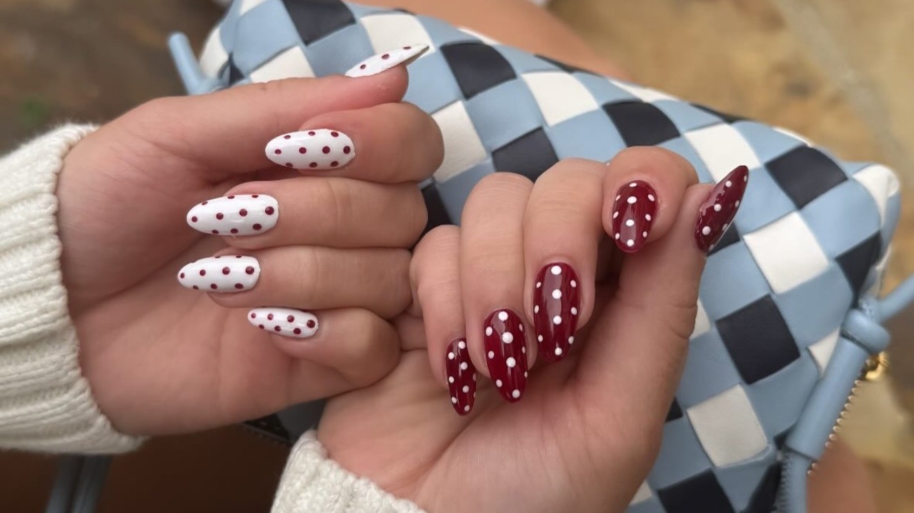 Photo of Sydney Sweeney wearing polka dot nails