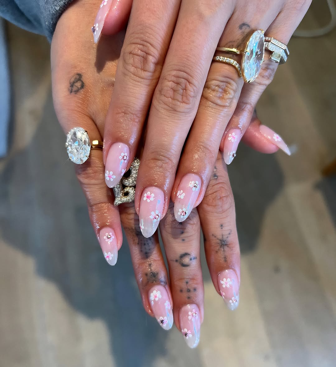 Hailey Bieber's cherry blossom nails by Zola Ganzorigt.