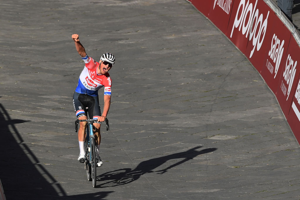 SIENA, ITALY - MARCH 06: Arrival / Mathieu Van Der Poel of Netherlands and Team Alpecin-Fenix Celebration, during the Eroica - 15th Strade Bianche 2021, Men&amp;amp;apos;s Elite a 184km race from Siena to Siena - Piazza del Campo / #StradeBianche / on March 06, 2021 in Siena, Italy. (Photo by Tim de Waele/Getty Images)