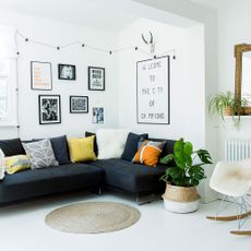 Living room with white wall and sofa