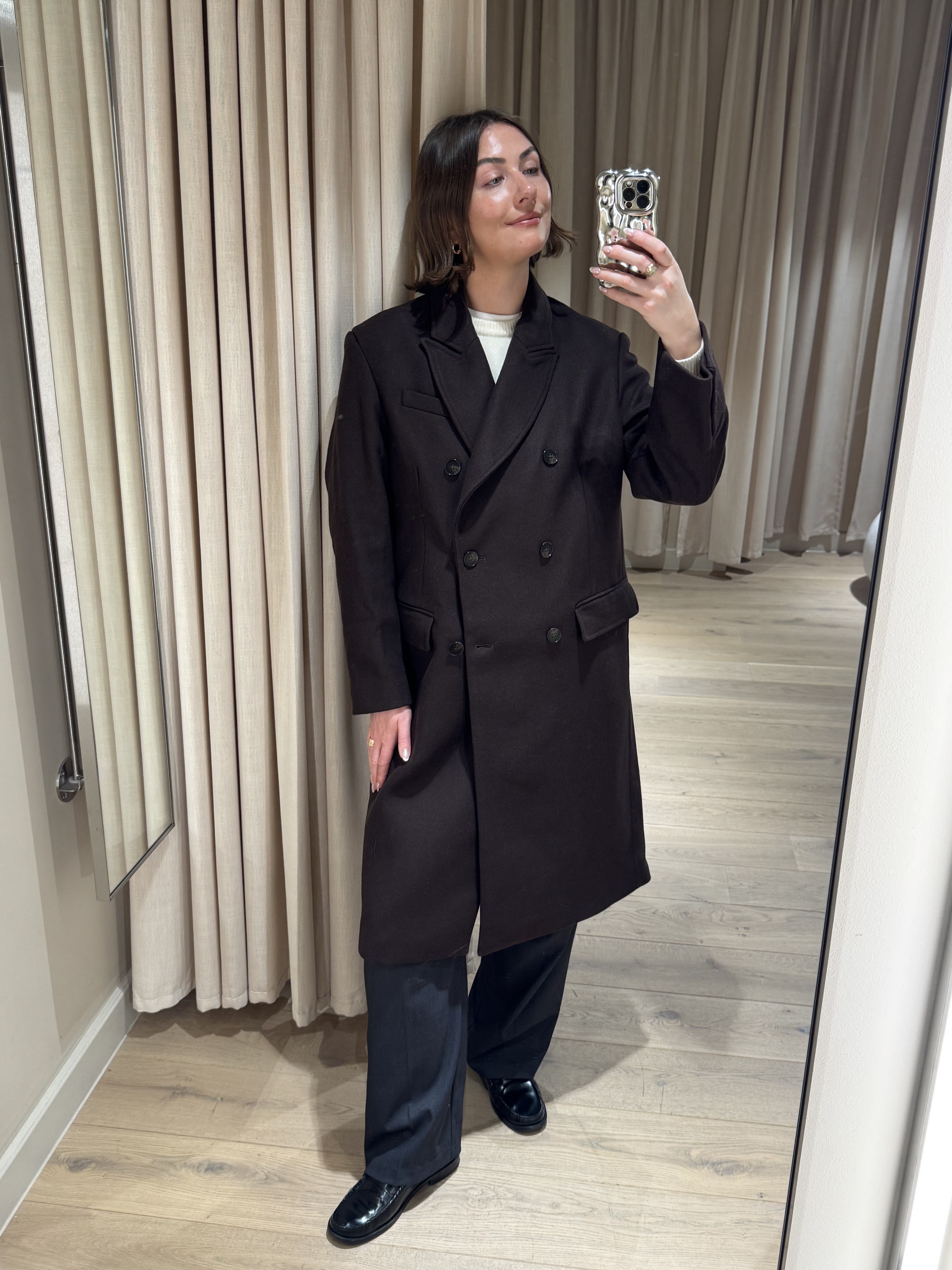 Sophie Robyn Watson wearing a coat from H&amp;amp;M.