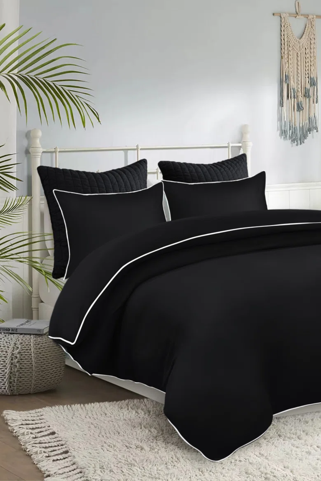 Black bedding with white piping
