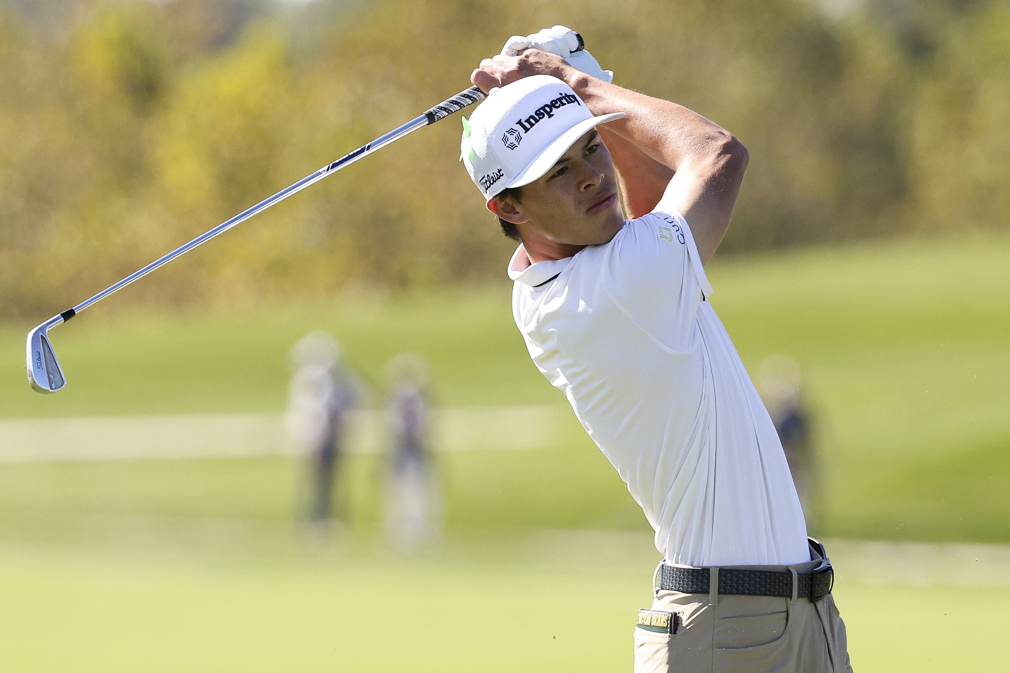 Johnny Keefer plays an iron shot