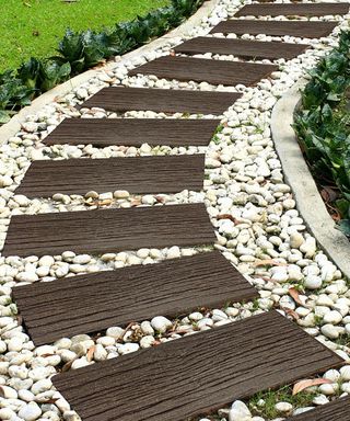 garden path made with railroad ties and pebbles