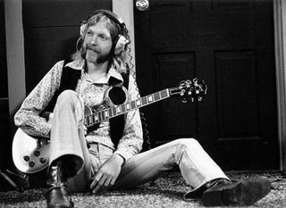 Duane Allman of the Southern rock group the 'Allman Brothers' holds his Gibson Les Paul electric guitar at Muscle Shoals Studios on September 23, 1969