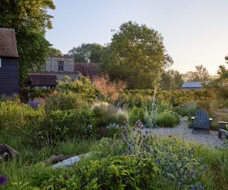 A richly planted garden with gravel pathways