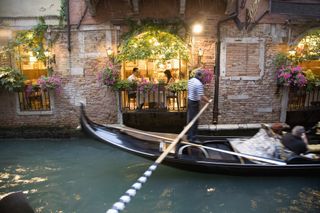 Couple in boat on Venice canal