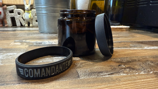 a photo of comandante's accessories the wristband and second jar