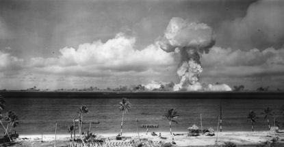 A mushroom cloud blossoms over Bikini Atoll, Marshall Islands, in 1946.